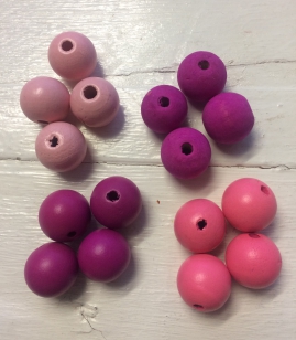 This is a Display of the Pink Wood Beads, please ask for size/colours