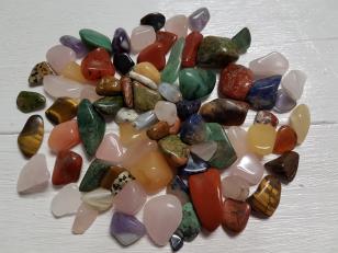 An Assortment of Tumbled Gemstones, NO hole. Stones can be glued with Top or put in a Spiral Cage