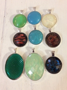 This is a Display of our Cabochon Pendants Available